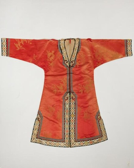 A Chinese red silk sanduo decorated ladys robe
