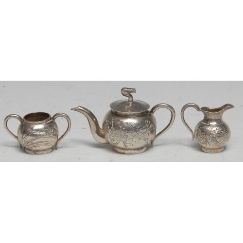 A Chinese silver miniature three piece globular tea service,...