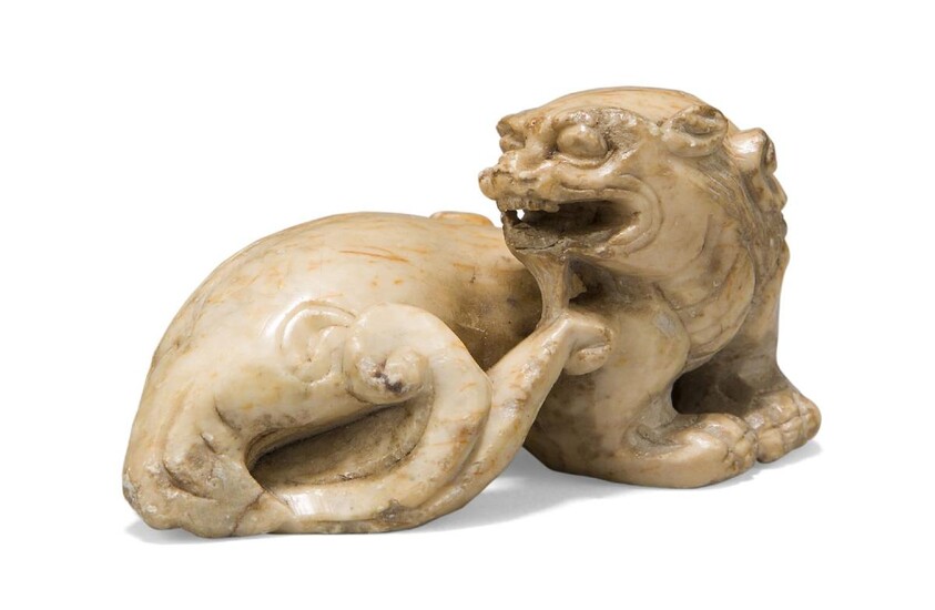 A Chinese soapstone 'bixi' carving, Ming dynasty, carved in a recumbent pose with head turned back towards the body, 7cm long