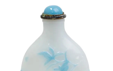 A Chinese turquoise-blue overlay white glass 'orchid' snuff bottle attributed to the...