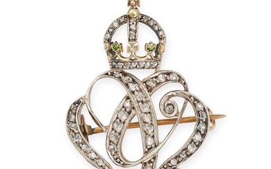 A DIAMOND AND DEMANTOID GARNET CYPHER BROOCH set throughout with rose cut diamonds, surmounted by a