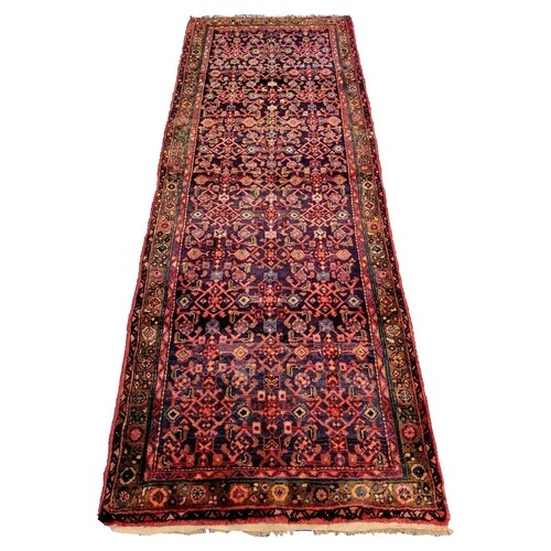 A FINE PERSIAN 100% WOOL HANDMADE RUNNER, with fantastic col...