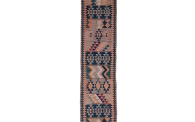 A FLAT-WOVEN KILIM RUNNER, CA. 1940s, 238 x 56cm the centra...