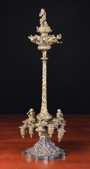 A Fine 19th Century Gilt Bronze Counter-top Cigar Holder/Lighter for a Shop. The twelve foliate cast