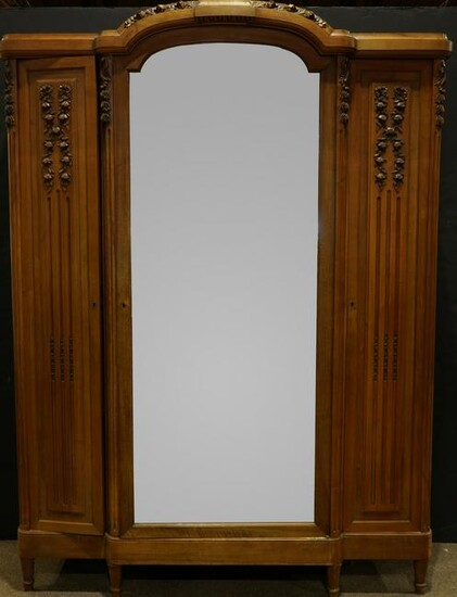 A French Louis XVI style triple door armoire