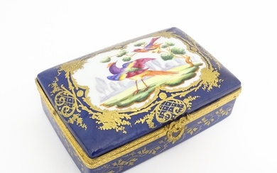A French porcelain box of rectangular form the cobalt blue g...