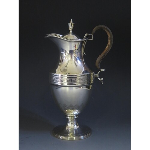 A George III Scottish Silver Hot Water Jug with beaded rim, ...