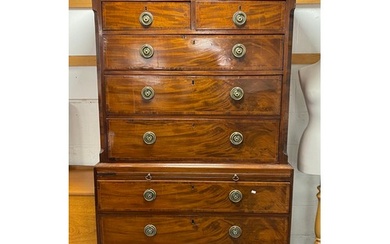 A George III mahogany and line inlaid chest on chest, the to...