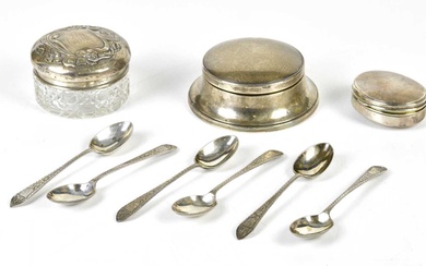 A George V hallmarked silver jewellery box of circular form,...