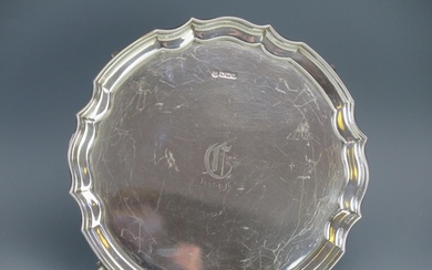 A George V silver circular salver, maker James Deakin & Sons...