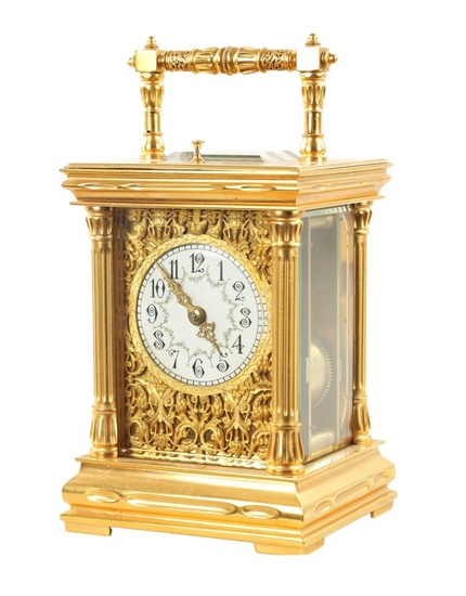 A LATE 19TH CENTURY FRENCH GILT CASED REPEATING CARRIAGE CLOCK