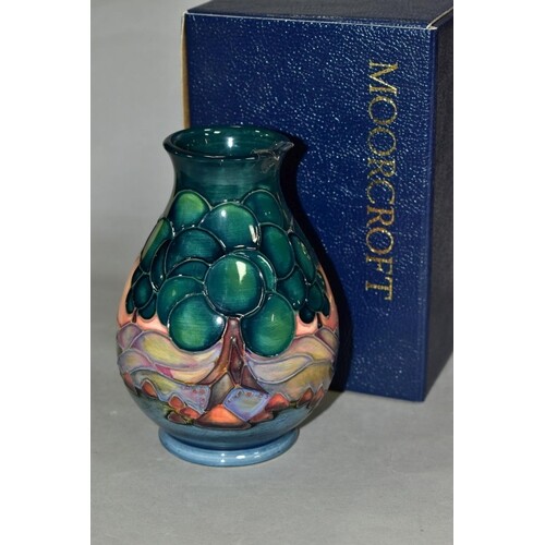A MOORCROFT BALUSTER SHAPED VASE designed by Sally Tuffin in...