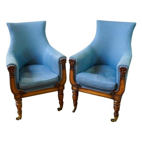 A PAIR OF REGENCY MAHOGANY AND UPHOLSTERED LIBRARY CHAIRS CI...