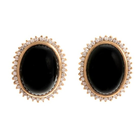 A Pair of Black Onyx & Diamond Earrings in 14K