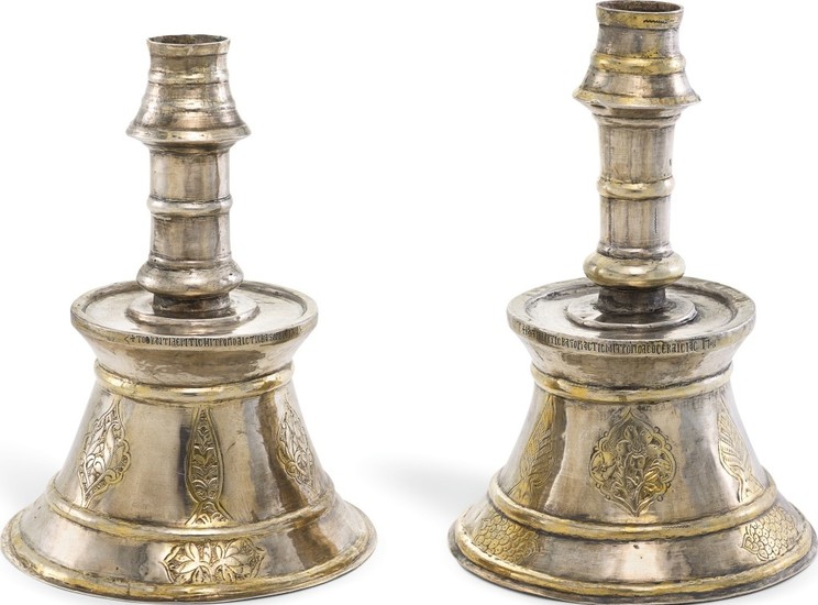 A RARE PAIR OF OTTOMAN SILVER-GILT CANDLESTICKS WITH GREEK INSCRIPTIONS, TURKEY, DATED 1708