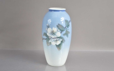 A Royal Copenhagen vase decorated with floral branch and butterfly