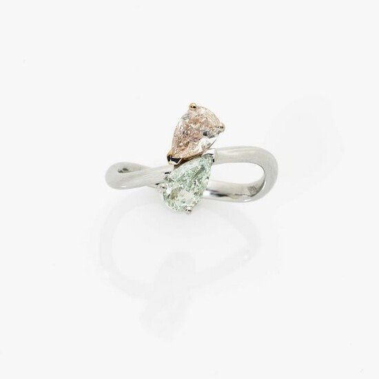 A Vis a Vis ring with natural light green and
