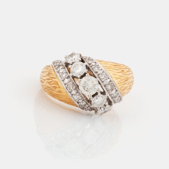 A WA Bolin ring in 18K gold set with round brilliant-cut diamonds