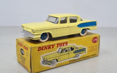 A boxed Dinky Toys No.179 yellow and blue Studebaker Preside...