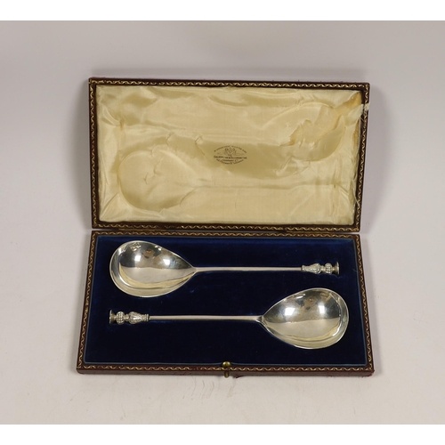 A cased pair of late Victorian silver seal top serving spoon...