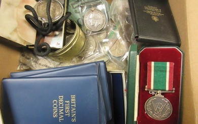 A collection of British and World Coins to include...