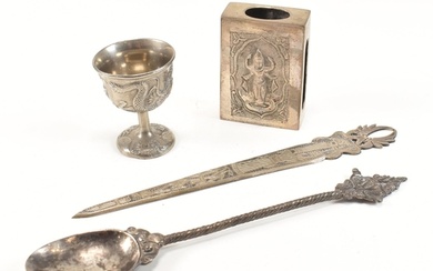 A collection of Eastern white metal items. The lot to includ...