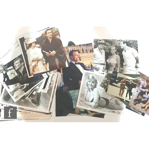 A collection of modern James Bond 8x10 film stills to includ...