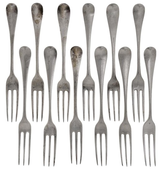 A composite set of twelve three pronged 18th century table forks, comprising three London, 1758, Ebenezer Coker; three London, 1762, William Cripps; three London, 1763, maker's mark rubbed; one London, c.1765, Thomas & William Chawner; one London...