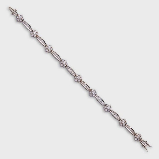 A diamond and platinum strap bracelet