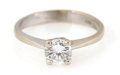 A diamond solitaire ring set with a brilliant-cut diamond weighing app. 0.60...