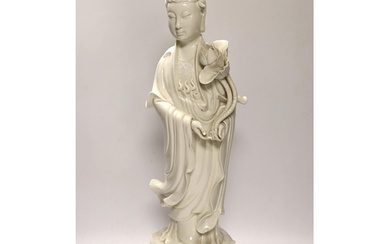 A large 20th century Chinese Blanc de Chine figure of Guanyi...
