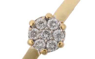 A modern 18ct gold diamond flowerhead cluster ring, claw set...