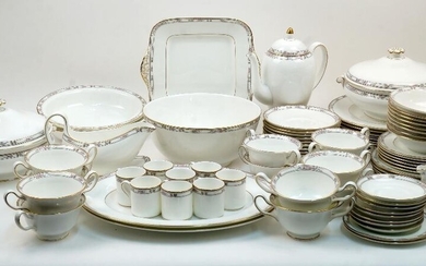 A modern Wedgwood 'Colchester' pattern dinner service, comprising: twelve dinner plates, eight dessert plates, six side plates and two tea plates, eight bowls, two oval platters, a square platter, a salad bowl, two oval serving dishes, two tureens...