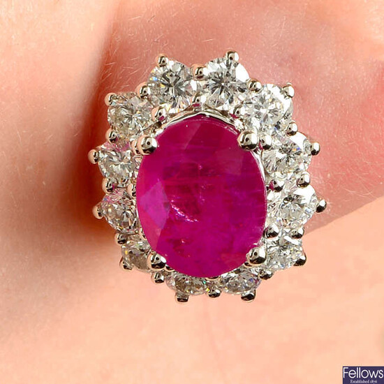 A pair of 18ct gold ruby and brilliant-cut diamond cluster ear studs.