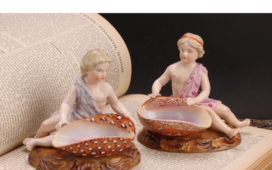 A pair of 19th century Sitzendorf figural table salts, of ch...