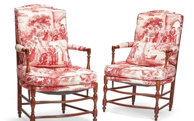 A pair of French Provincial beechwood fauteuils
