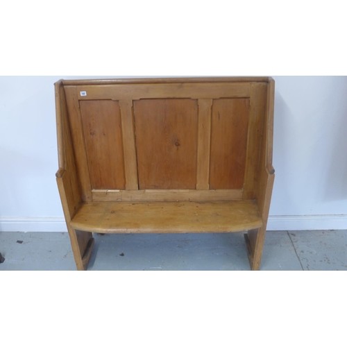 A pine hall bench with with a panelled back 117cm tall x 115...