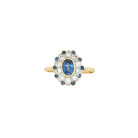 A sapphire and diamond cluster ring, retailed by Joseph Bonnar