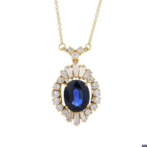 A sapphire and diamond pendant, on 18ct gold chain.