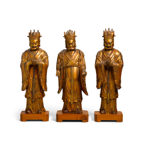 A set of three lacquered Wood Daoist household guardians