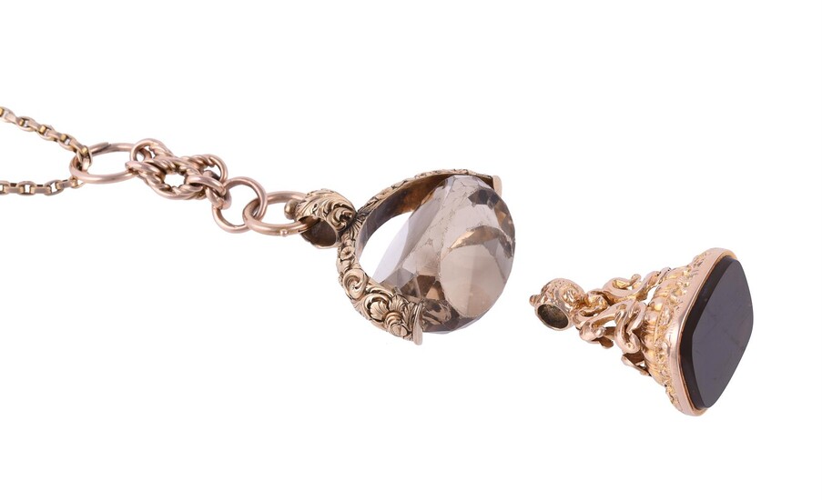 AN ANTIQUE CITRINE SWIVEL FOB ON CHAIN