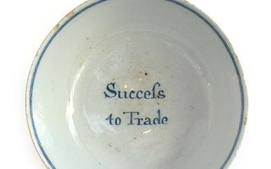 An 18th century English Delft bowl, the inside reading 'Succ...