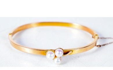An Antique 15 Carat Gold Bangle set with 3 Pearls. Stamped ...