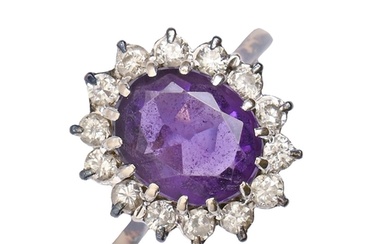 An amethyst and diamond oval cluster ring, in 18ct gold, 5.8...