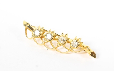 An early 20th century Continental unmarked yellow metal and diamond bar brooch with four flower