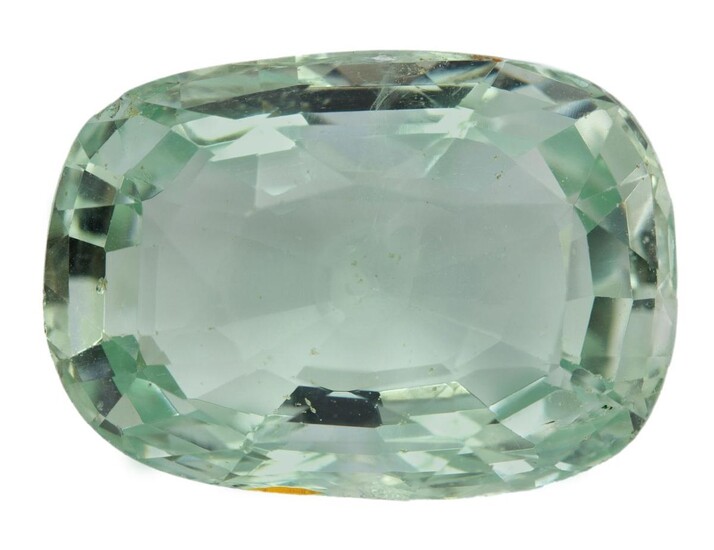 An unmounted cushion shaped aquamarine, weighing approximately 28 carats.