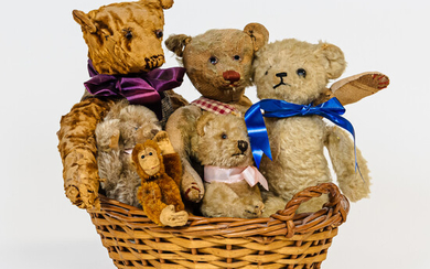 Basket of Stuffed Toy Bears and a Monkey