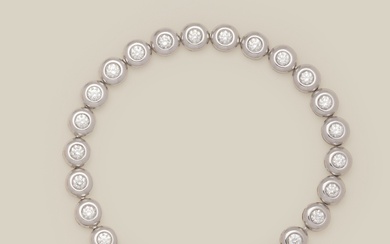 Bracelet ligne en or gris 18K (750/1000) composé de vingt six diamants taille brillant en...