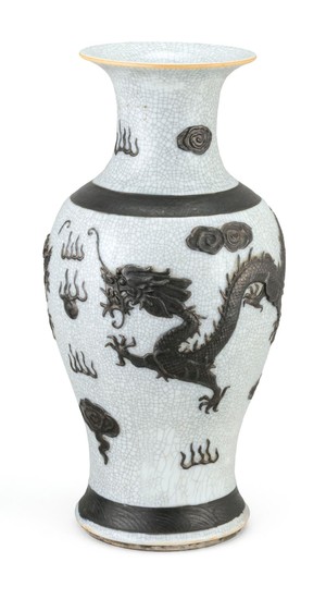 CHINESE WHITE CRACKLEWARE PORCELAIN VASE In baluster form, with iron glaze banded decoration around the shoulder and foot, and molde...