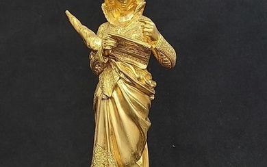 Circa 1900 Gilt bronze signed MC Favre woman wearing classical garments, cradling spool of yarn &